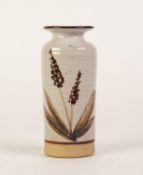 RETA VINCE, LONDON, STUDIO POTTERY CYLINDRICAL VASE, grey glazed and painted with a flowering plant