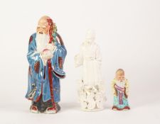 CHINESE PORCELAIN FIGURE OF A DEITY IN A BLUE ROBE, 10in (25.4cm) high; SIMILAR FIGURE, 4in (10.1cm)