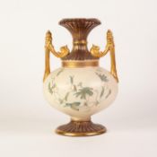 A LATE VICTORIAN  CHARLES BARLOW POTTERY TWO HANDLED PEDESTAL VASE, the swollen body printed with