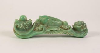 A CHINESE GREEN JADE CARVING OF RUYI SCEPTER FORM, with a carp amongst lotus, 8 1/4" (21cm) long