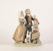 LLADRO, SPANISH, PORCELAIN GROUP OF THREE CAROL SINGERS WITH THEIR DOG, the two girls with musical