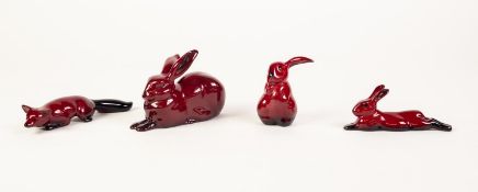 THREE ROYAL DOULTON FLAMBE WARE POTTERY MODELS OF RABBITS, 3? (7.6cm) high and smaller, together