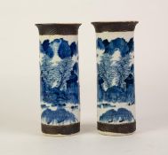 A PAIR OF LATE NINETEENTH CENTURY CHINESE PORCELAIN CYLINDRICAL VASES,  painted in underglaze blue