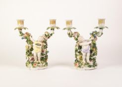 A PAIR OF LATE NINETEENTH CENTURY GERMAN SITZENDORF PORCELAIN TWIN BRANCH CANDELABRA, each with a