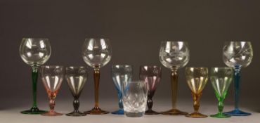 TWO SIMILAR PAIRS OF HOCK GLASSES, one pair with floral cut bowls and all with harlequin stems,