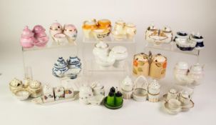 SEVENTEEN EARLY TWENTIETH CENTURY ENGLISH AND CONTINENTAL POTTERY AND PORCELAIN CONDIMENT SETS,