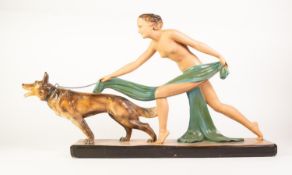 ART DECO PAINTED PLASTER GROUP OF A NAKED FEMALE FIGURE WITH ALSATIAN DOG, painted in natural