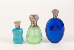 A VICTORIAN BRISTOL BLUE GLASS FLATTENED OVAL FACET-CUT PERFUME FLASK, with embossed silver coloured