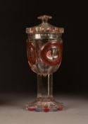 EARLY 19th CENTURY BOHEMIAN CLEAR, RUBY AND SAPPHIRE BLUE FLASHED CUT GLASS POKAL OR COVERED GOBLET,