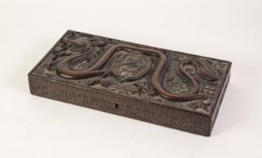 CHINESE CARVED HARDWOOD SHALLOW OBLONG BOX, the hinged lid carved in free relief with a writhing