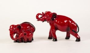 TWO ROYAL DOULTON FLAMBE WARE POTTERY MODELS OF ELEPHANTS, one modelled standing with trunk