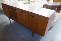 G-PLAN TEAK LONG, LOW SIDEBOARD, with three cupboard doors, the right hand pair fitted as a cocktail