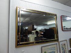 A MODERN OBLONG BEVELLED EDGE WALL MIRROR, IN SMOKED MIRROR GLASS FRAME, 2?8? HIGH X 3?4? WIDE