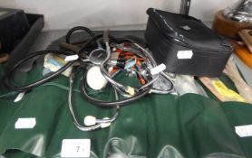 SELECTION OF DOCTORS INSTRUMENTS IN A PLASTIC ROLL INCLUDING 3 STETHOSCOPES  ETC...