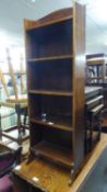 A MAHOGANY NARROW FIVE TIER OPEN BOOKCASE AND A SINGLE CHAIR (2)