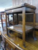 AN OAK TWO TIER TEA TROLLEY/CARD TABLE