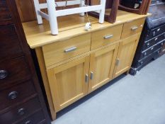 MORRIS FURNITURE, LIGHT OAK SIDEBOARD WITH THREE SHORT DRAWERS OVER THREE DOORS