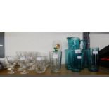 A SET OF FOUR CUT GLASS TUMBLERS,  SET OF SIX CUT GLASS WINE GOBLETS, A SMOKED GLASS WATER SET OF