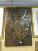 AN EMBOSSED BRONZED METAL LARGE RECTANGULAR END PANEL, DEPICTING A FEMALE FIGURE WITH ART NOUVEAU