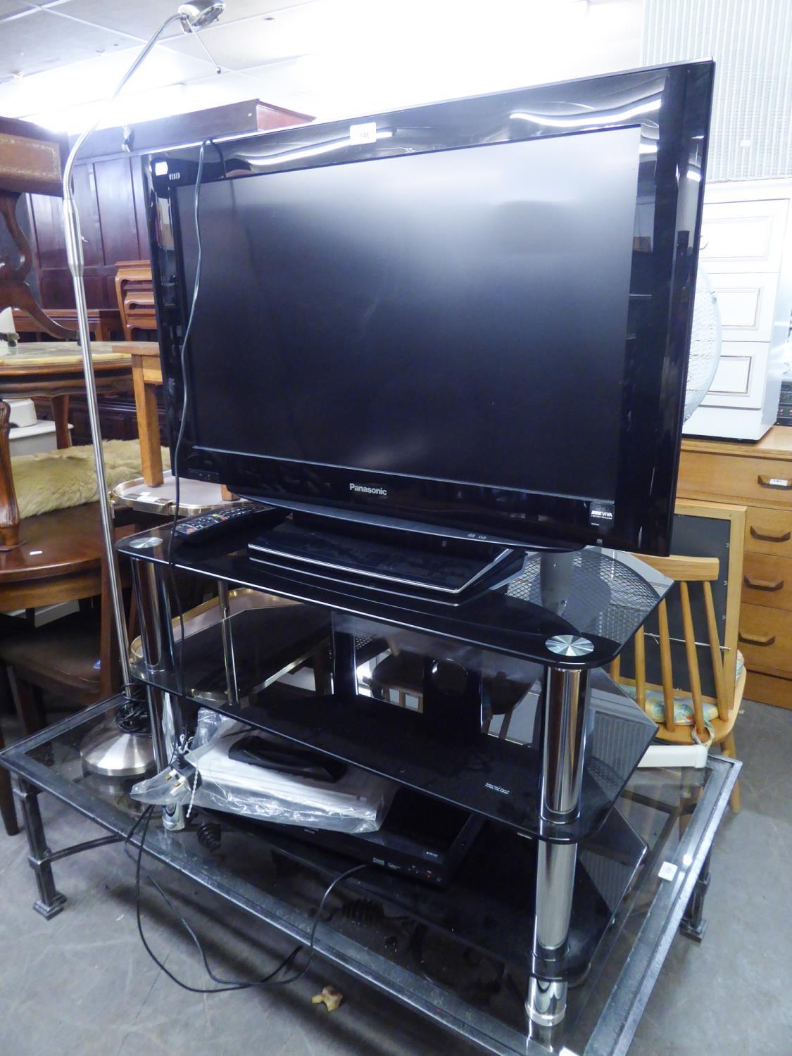 PANASONIC VIERA FLAT SCREEN TELEVISION ON BLACK GLASS, THREE-TIER STAND, WITH DVD PLAYER