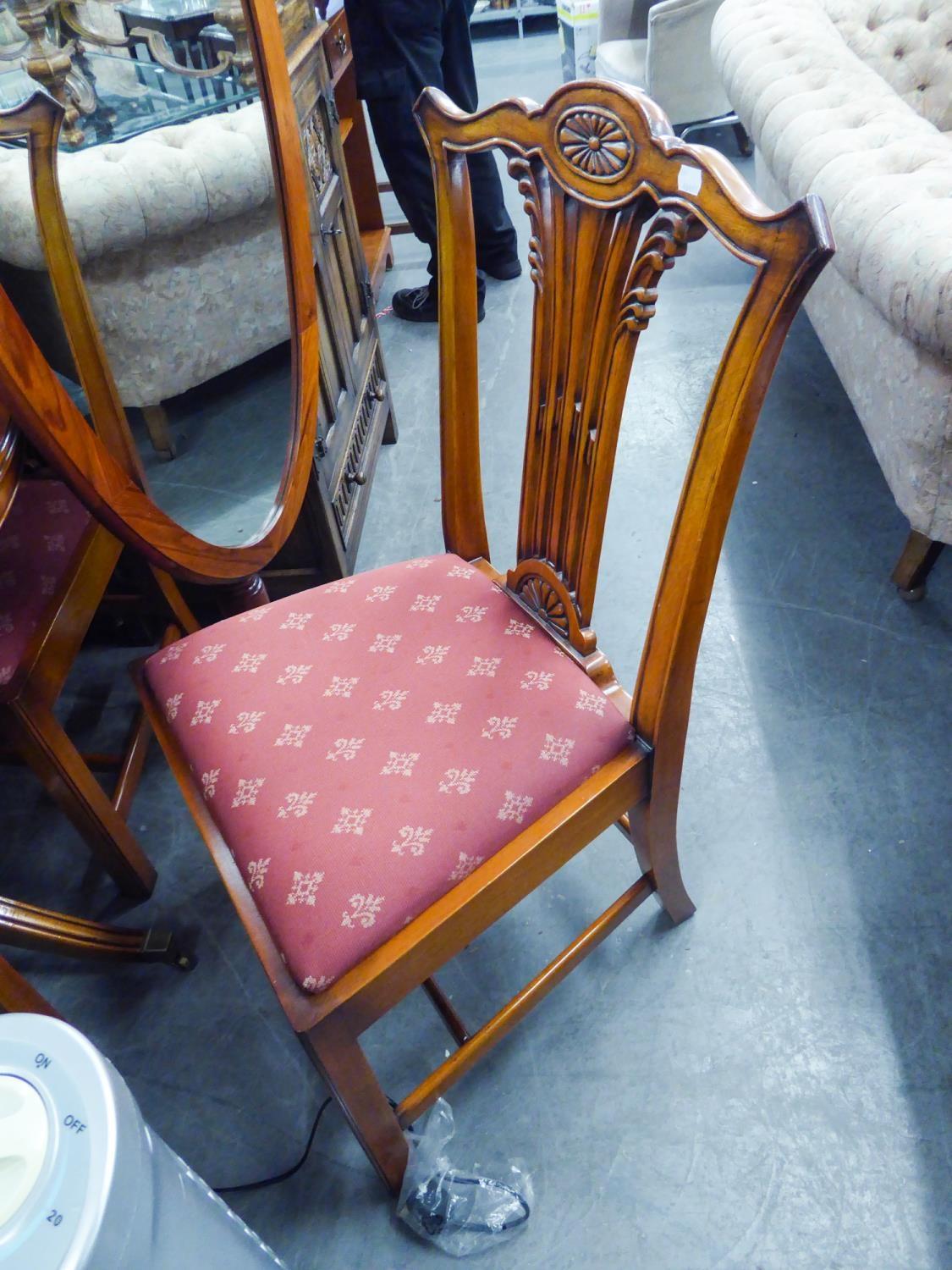 A SET OF FOUR REPRODUX CARVED MAHOGANY CHIPPENDALE STYLE DINING CHAIRS, WITH DROP-IN SEATS