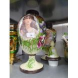 A PAIR OF VICTORIAN WHITE OPAQUE GLASS OVULAR PEDESTAL VASES, THE FRONTS DECORATED WITH PORTRAITS OF