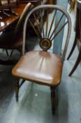 A SET OF FOUR HARD WOOD DINING CHAIRS, WITH RADIATING SPINDLE BACKS