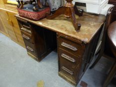 AN OAK DOUBLE PEDESTAL DESK WITH SIX DRAWERS AND TWO SLIDES, 3?6? X 2?3?