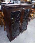 ANTIQUE FLAMED MAHOGANY SUPERSTRUCTURE BOOKCASE HAVING GLAZED DOORS