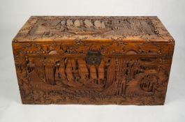 LARGE CHINESE CARVED CAMPHOR? WOOD CHEST with hinged lid, 4ft (121.9cm) wide