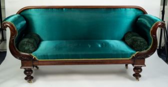 LARGE VICTORIAN MAHOGANY FRAMED SOFA covered in vibrant green fabric, the frame with plain rounded