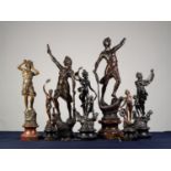 SEVEN VICTORIAN DARK PATINATED SPELTER FIGURES, including three pairs, two being commerce and