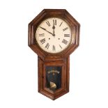 TWENTIETH CENTURY ANSONIA ?REGULATOR A? OAK CASED DROP DIAL WALL CLOCK, the 12? Roman dial powered