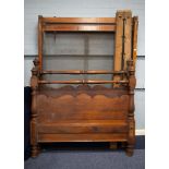 NINETEENTH CENTURY PITCH PINE DOUBLE BEDSTEAD, with sprung base, 53? (134.6cm) high, 83 ½? x 55? (