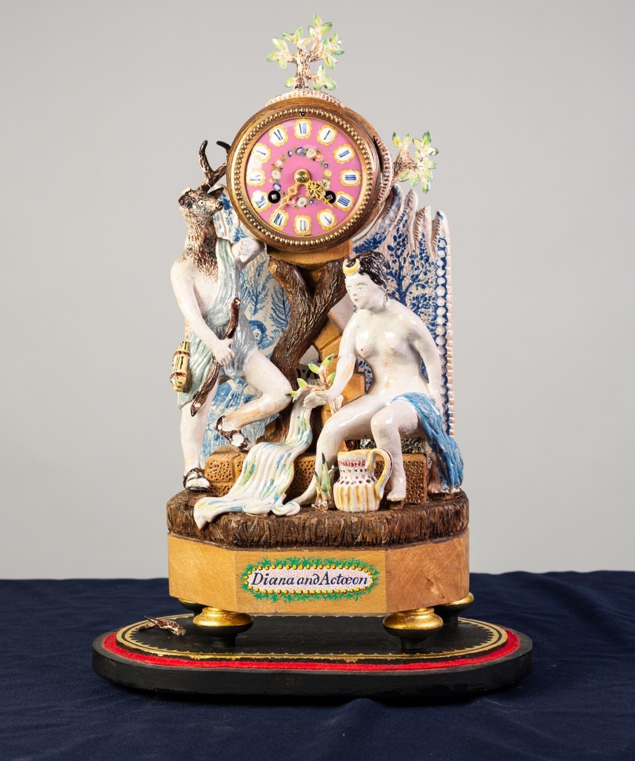 ?DIANA AND ACTOEON? COMPOSITE POTTERY AND WOOD FIGURAL MANTLE CLOCK, the 3? pink porcelain dial with - Image 2 of 3