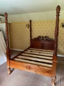 MODERN CONTINENTAL CARVED MAHOGANY FOUR POSTER BED, with panelled ends, the headboard with foliate