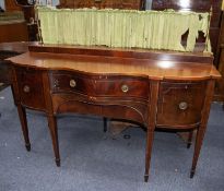 EARLY NINETEENTH CENTURY MAHOGANY AND LINE INLAID SERPENTINE FRONTED SIDEBOARD, the shaped top