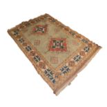 CAUCASIAN LOOSELY WOVEN LARGE RUG with two large diamond shaped medallions with arrow motifs and