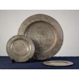 ANTIQUE PEWTER CHARGER, with broad rim, 17? (43.2cm) diameter, together with a PAIR OF ANTIQUE