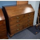 GEORGE III MAHOGANY BUREAU, of typical form with two short and three long drawers, fitted with brass