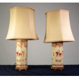 PAIR OF MODERN CHINESE HEXAGONAL TALL POTTERY TABLE LAMPS, design of female rider and attendants,