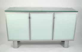 MODERNIST BRUSHED STEEL AND GLASS SIDEBOARD, the slightly raised, oblong, heavy glass top above