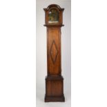 TWENTIETH CENTURY OAK GRANDMOTHER LONGCASE CLOCK, the 8? brass Roman dial with mask spandrels and ?