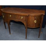 EARLY NINETEENTH CENTURY MAHOGANY SERVING TABLE, the shaped top above a central, cockbeaded frieze