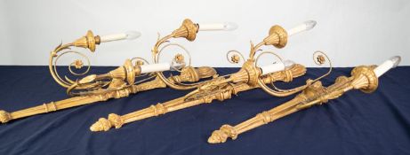 SET OF THREE CARVED WOOD AND GILT GESSO LARGE WALL LIGHTS with flambeau patttern tops, the tapered
