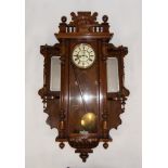 EARLY TWENTIETH CENTURY WALNUT CASED VIENNA WALL CLOCK WITH ADDITIONAL/ LATER SIDE PIECES, the clock