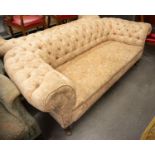 LATE VICTORIAN CHESTERFIELD THREE SEATER SETTEE button upholstered in heavy pink and floral fabric