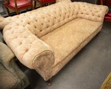 LATE VICTORIAN CHESTERFIELD THREE SEATER SETTEE button upholstered in heavy pink and floral fabric