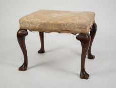 ANTIQUE EARLY GEORGIAN REVIVAL WALNUT DRESSING OR FOOTSTOOL, the stuff-over seat above cabriole