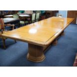 ART DECO SATINWOOD AND BURR WOOD BOARDROOM TABLE, the rounded oblong, crossbanded top above a